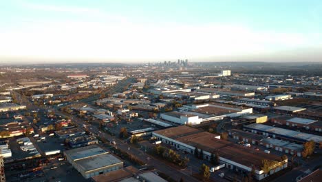 flying over warehouses in busy industrial zone in calgary, alberta