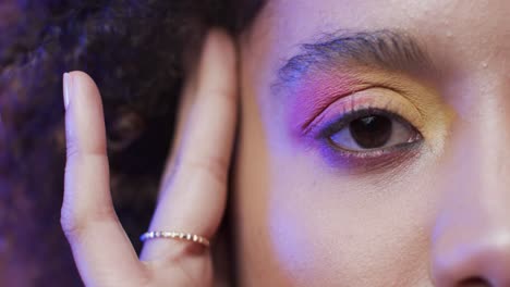 Eye-of-biracial-woman-with-dark-hair,-slow-motion