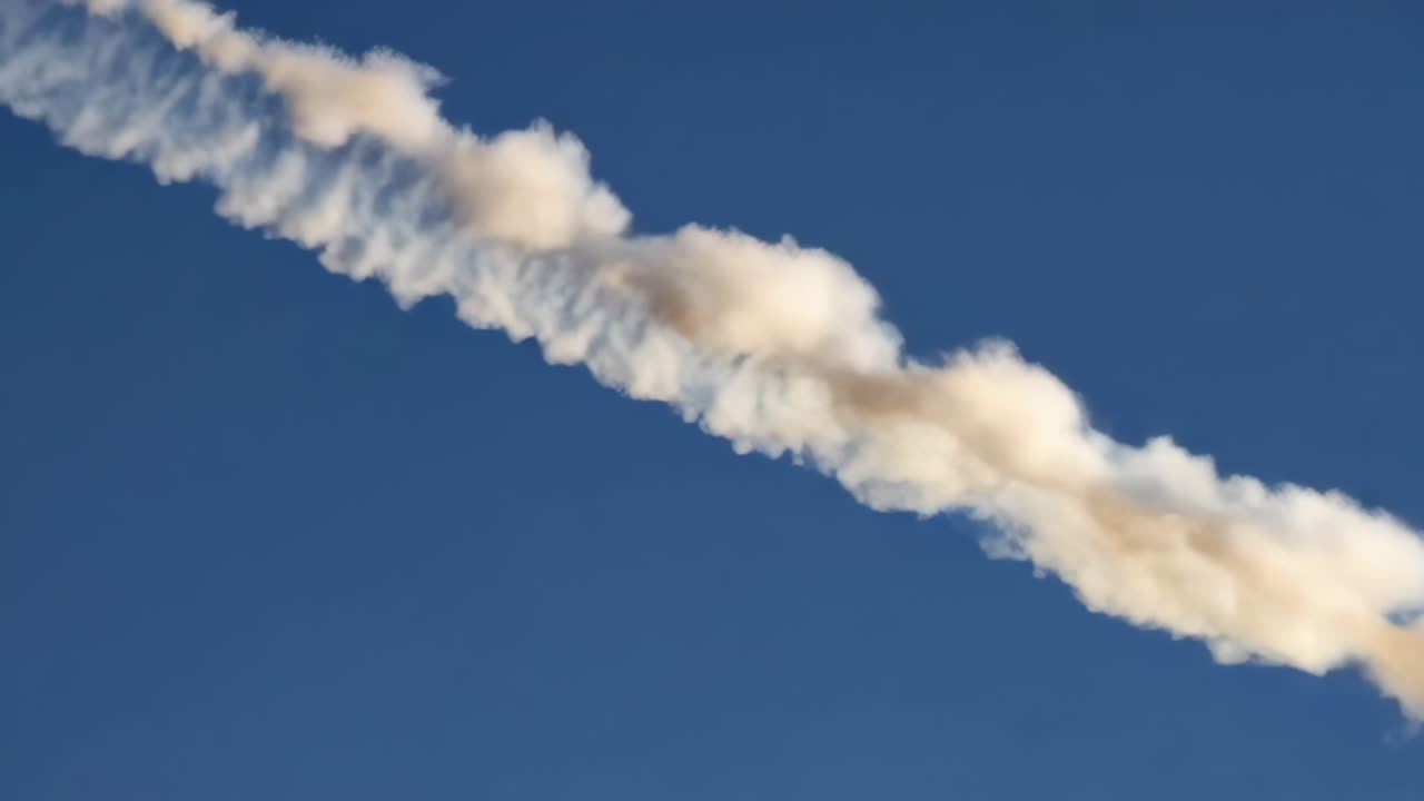 Airplane Exhaust Contrail against a Blue Sky