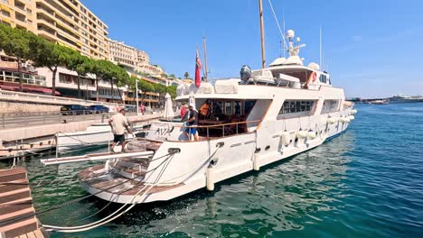 crew cleaning yacht at monte carlo pier
