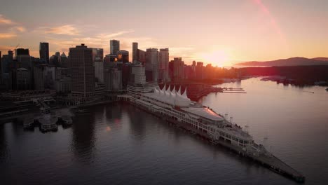 Flying-over-the-Vancouver-city-skyline-at-sunset