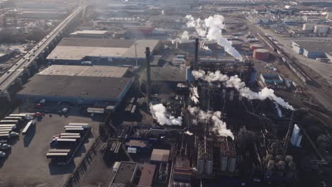 industrial complex with smokestacks in hamilton, ontario, during daylight, aerial view