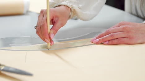 female fashion designers drawing sketches for clothes in atelier. sequence