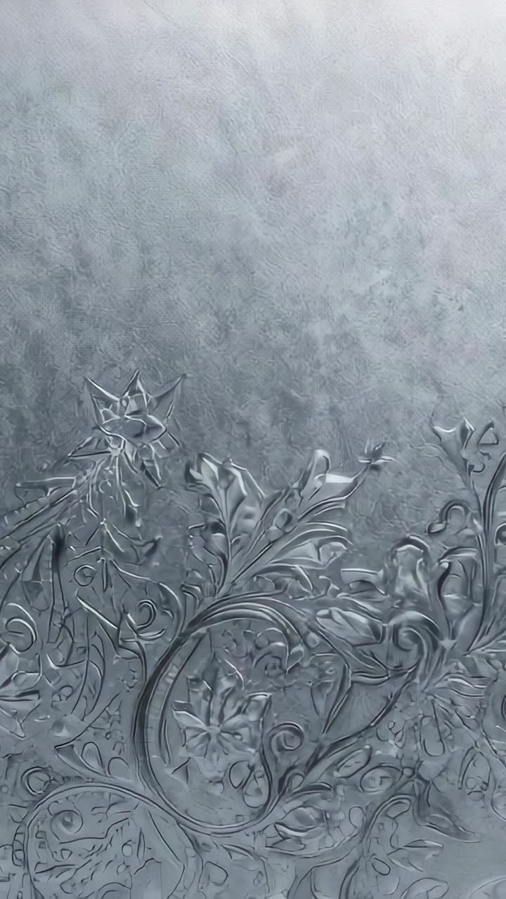 Vertical video: Shifting frosted glass moving from camera shake in room, showing embossed vines