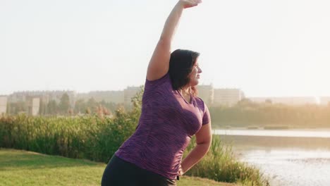 Female-athlete-stretching-her-arms-and-hands