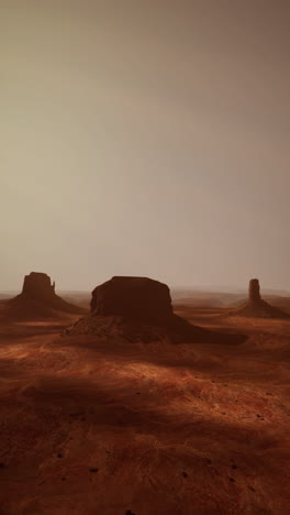 arid desert landscape with distant rocks