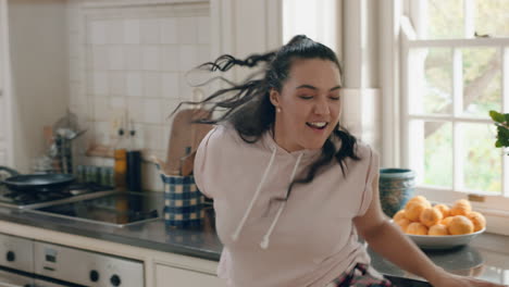 happy-overweight-teenage-girl-dancing-in-kitchen-having-fun-celebrating-weekend-performing-funny-dance-moves-at-home-enjoying-weekend-celebration