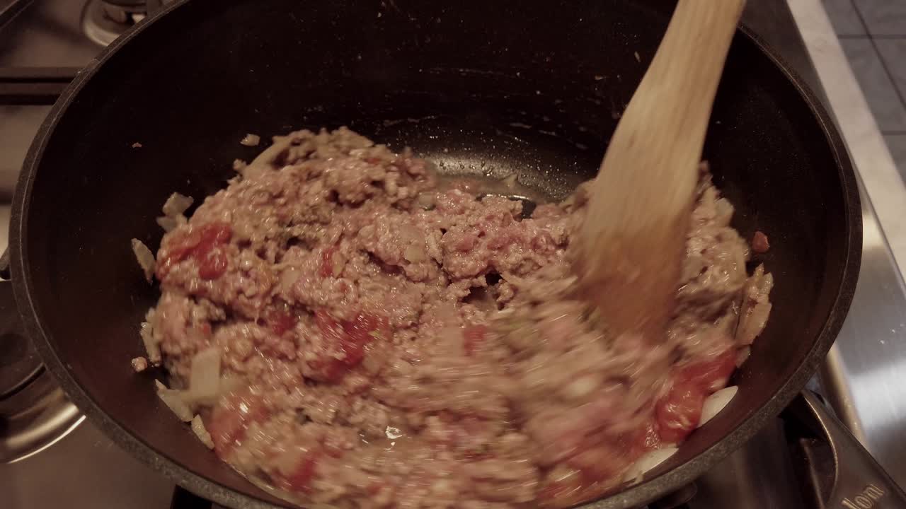Cooking Ground Beef with Onions and Tomatoes