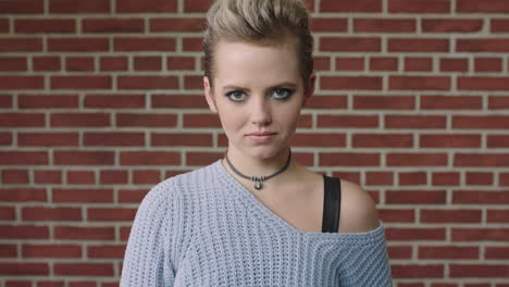 fashion portrait of young stylish woman smiling posing looking to camera