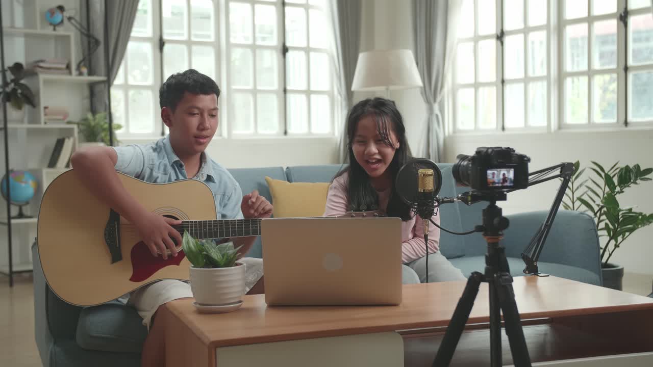 Children Playing Guitar and Recording a Vlog
