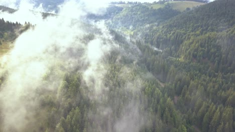 Overhead-Aerial-Drone-Shot-of-the-Romanian-Mountains-with-Beautiful-Moving-Valley-Fog