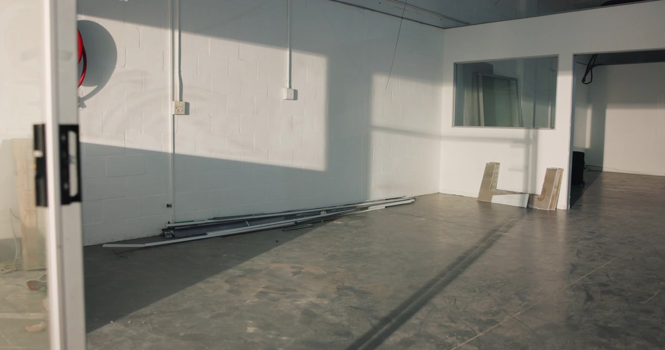 Empty Industrial Studio Space with Natural Sunlight