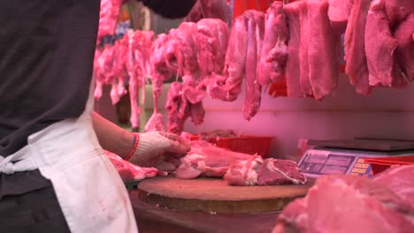 chopping chunks of meat