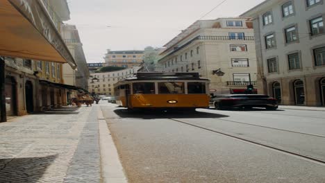 lisbon tram in a city street