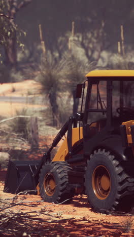 excavator in a desert landscape