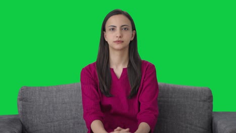 Serious-Indian-woman-looking-to-the-camera-Green-screen