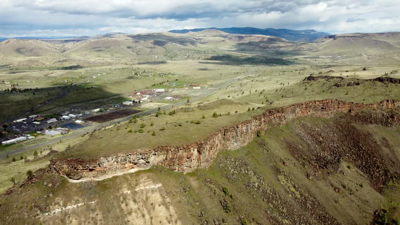 US, Oregon, Warm Springs, , 2025-04-07 - Drone view of the Confederated Tribes of Warm Springs in central Oregon, flying over a ridge line in spring