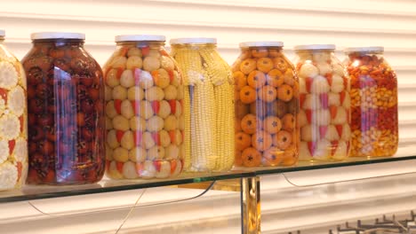 assorted pickled vegetables in jars