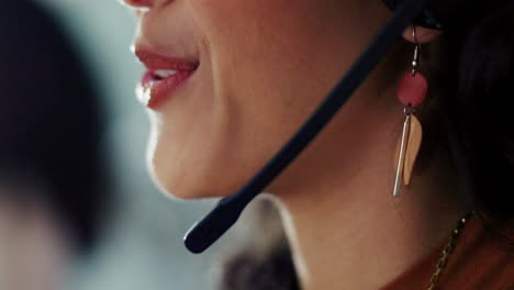 close-up of a woman talking on headset