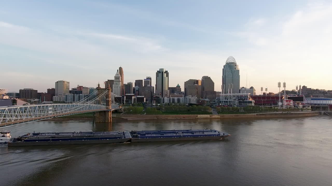 Drone shot descending of a barge going under the John A