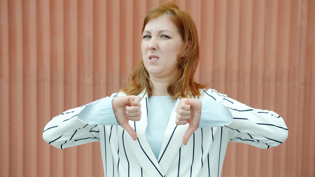 Woman giving a thumbs down