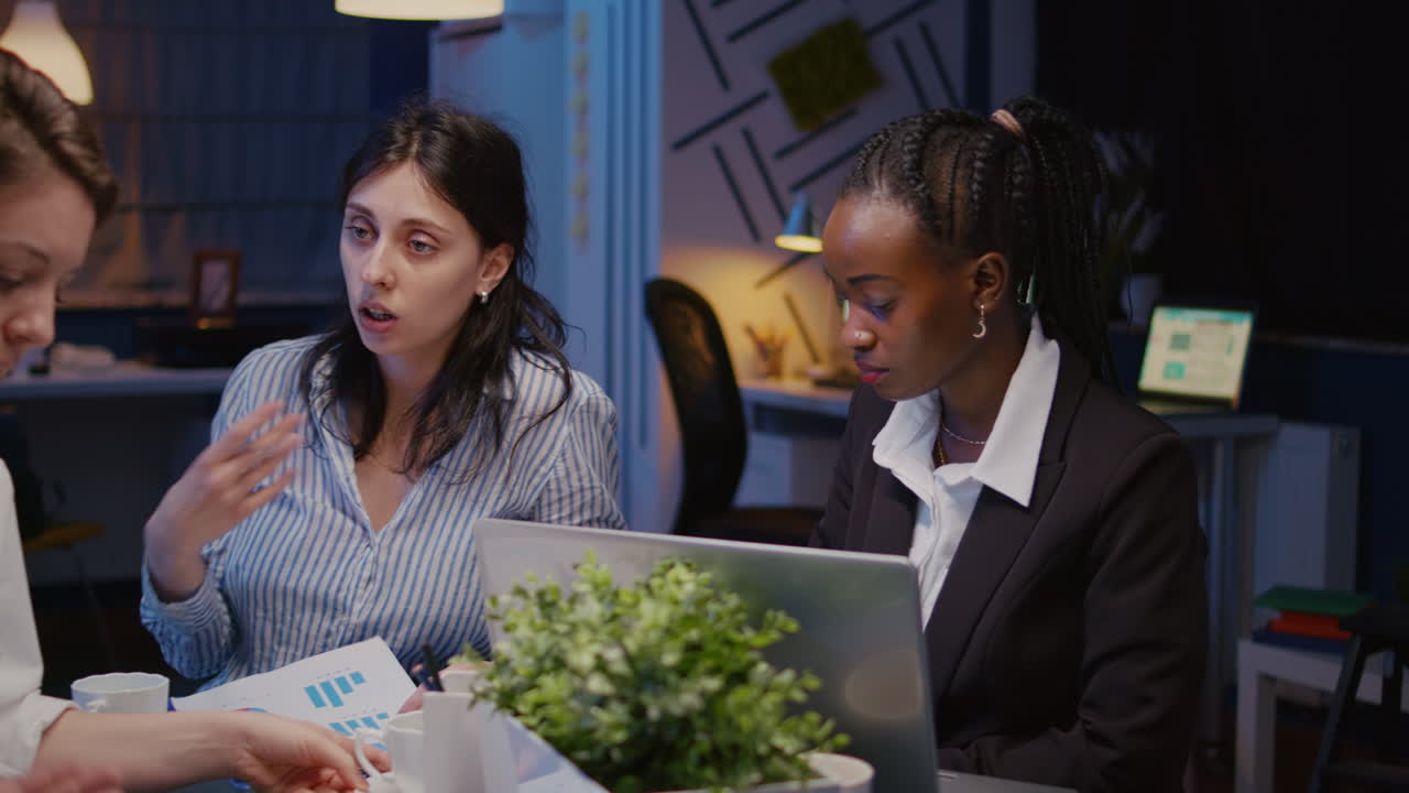 Multi-ethnic diverse businesspeople brainstorming company ideas working at management presentation