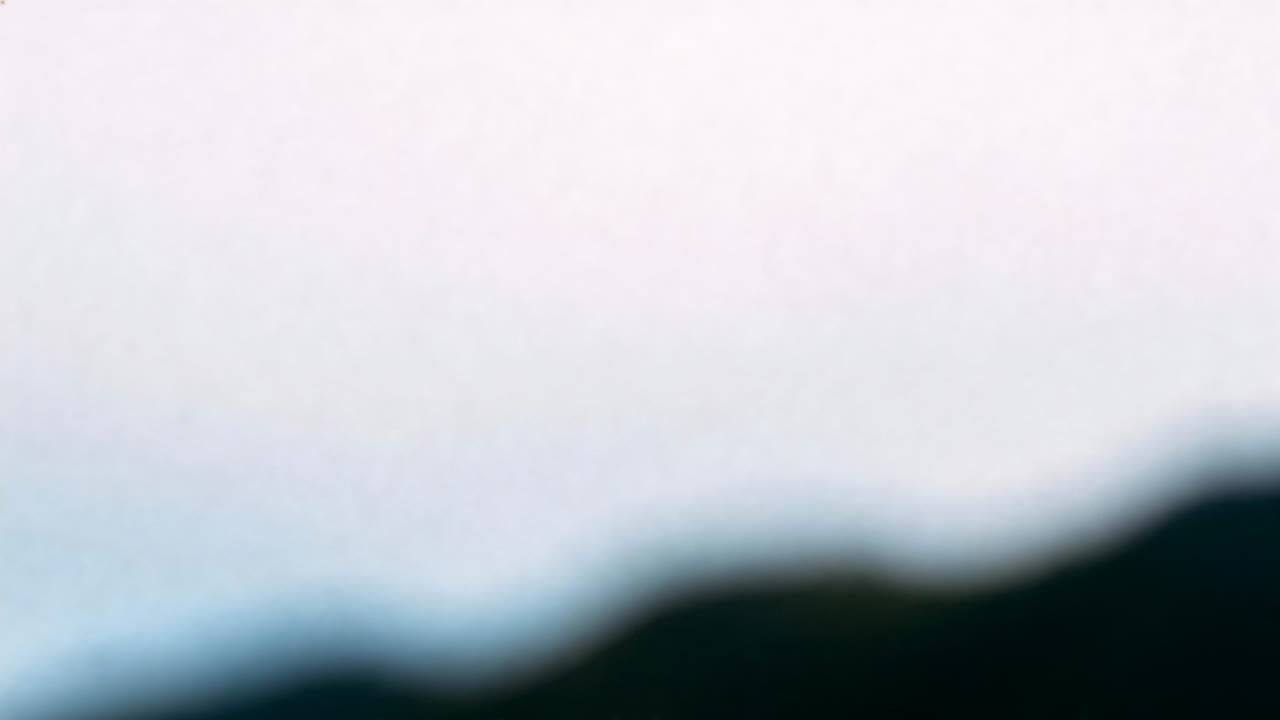 Starting camera recording and capturing blurred ridge along overcast horizon to record sky change