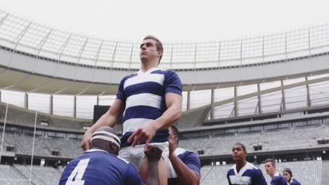 male rugby players playing rugby match in stadium 4k