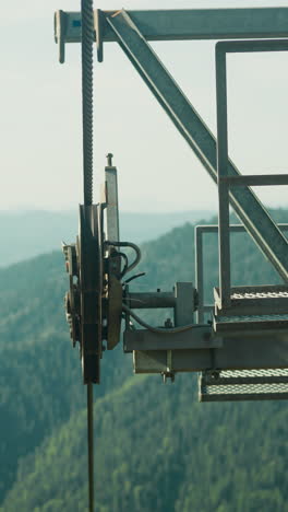chairlift machine for transportation travellers. transport for tourists resting in mountains. utterly spectacular landscape of mountains covered with plants