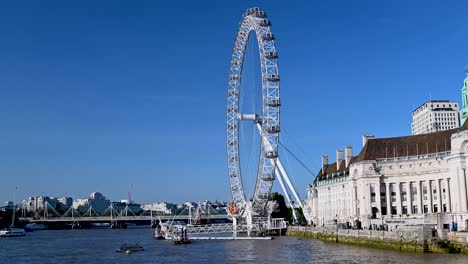 view of the london eye from westminster bridge - millennium wheel, london, united kingdom