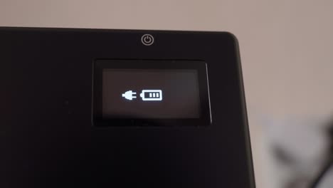 the process of charging the device, video light. charging gadgets. selective focus