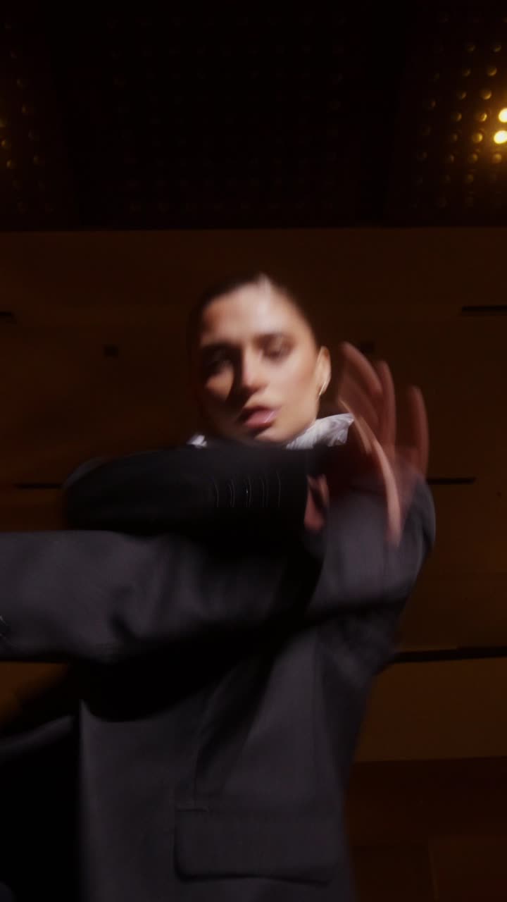 Stylish Dance Performance in a Black Suit