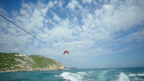 parasailing is done over the boat