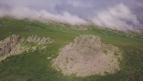 mountain scenery with clouds and fog