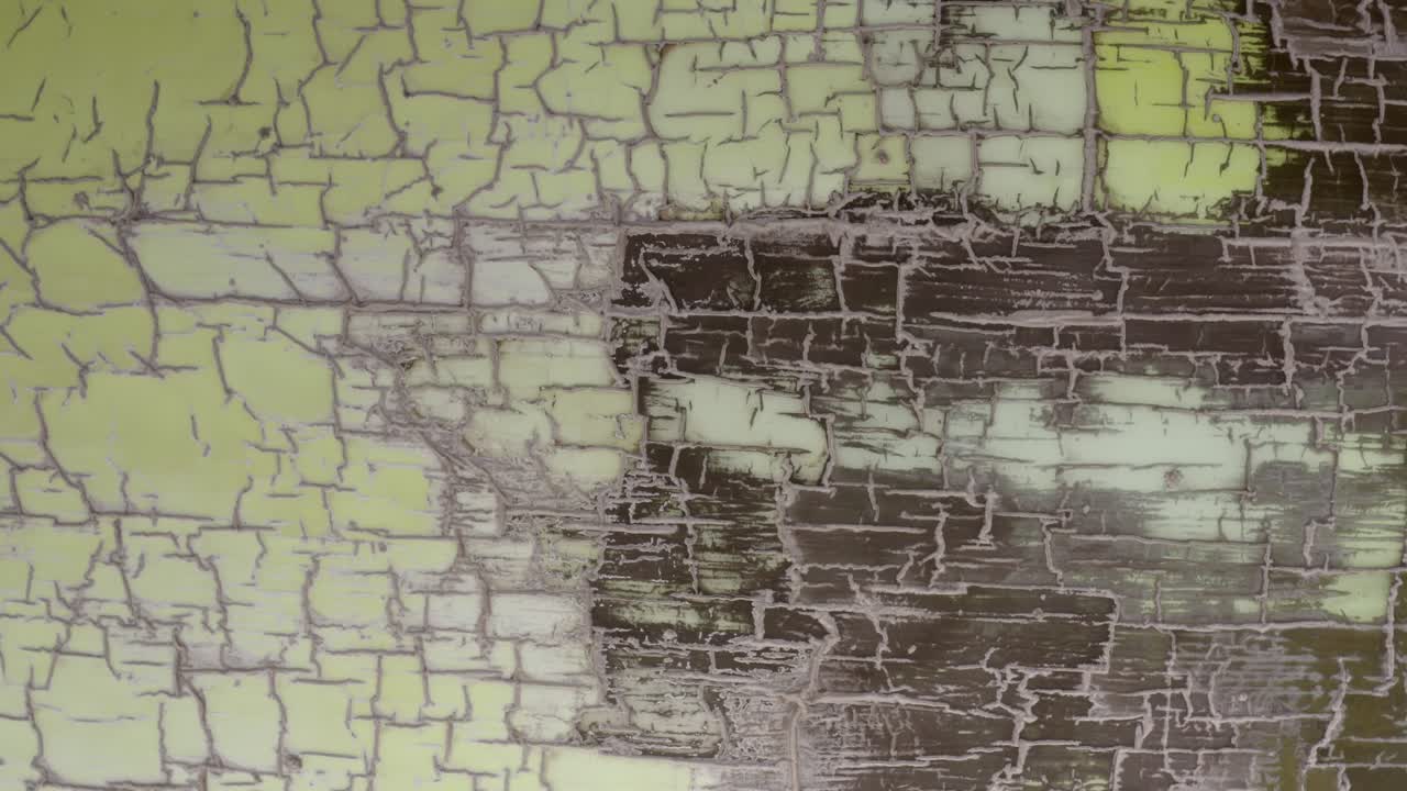 Cracked Pale Yellow Paint Surface