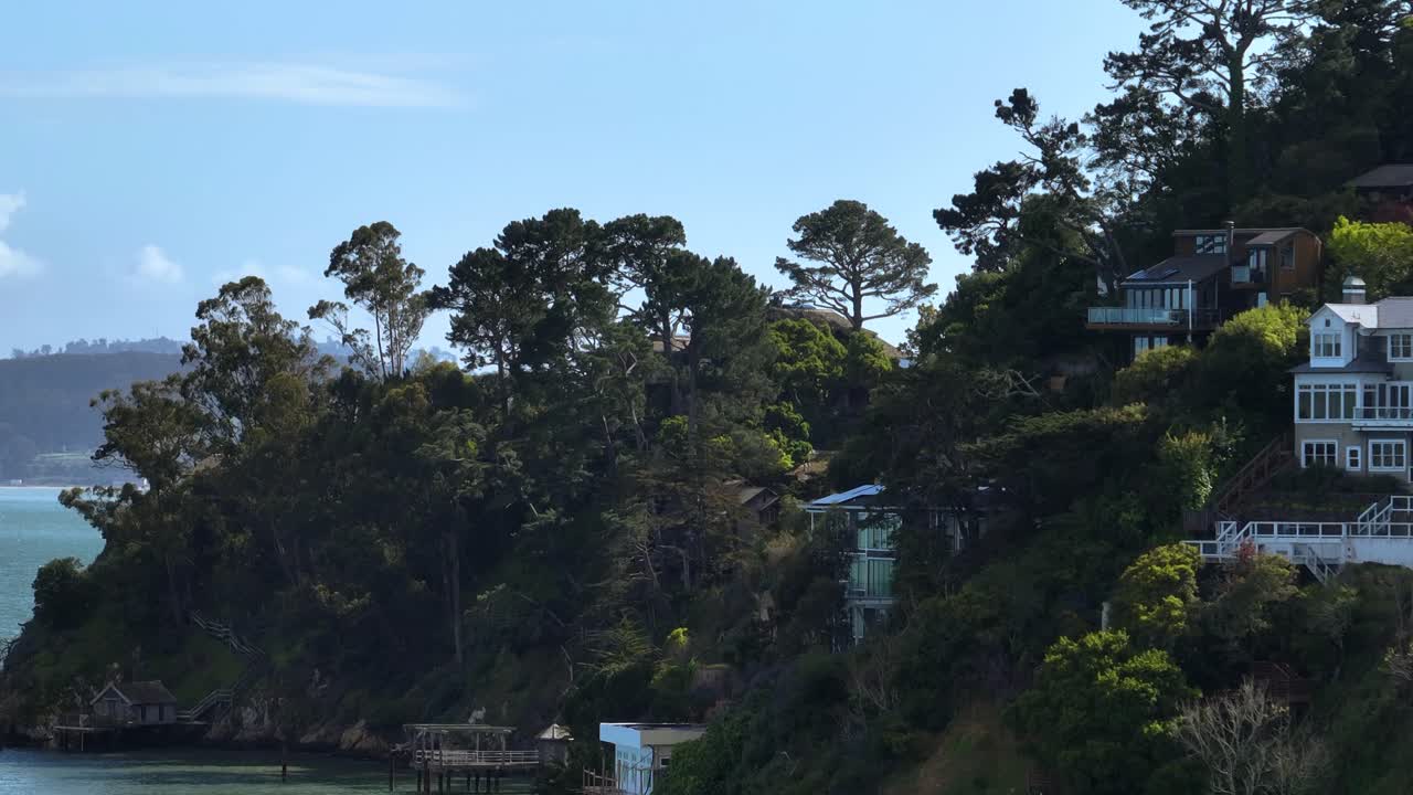 Telephoto drone shot of seaside homes on the Belvedere island in San Francisco