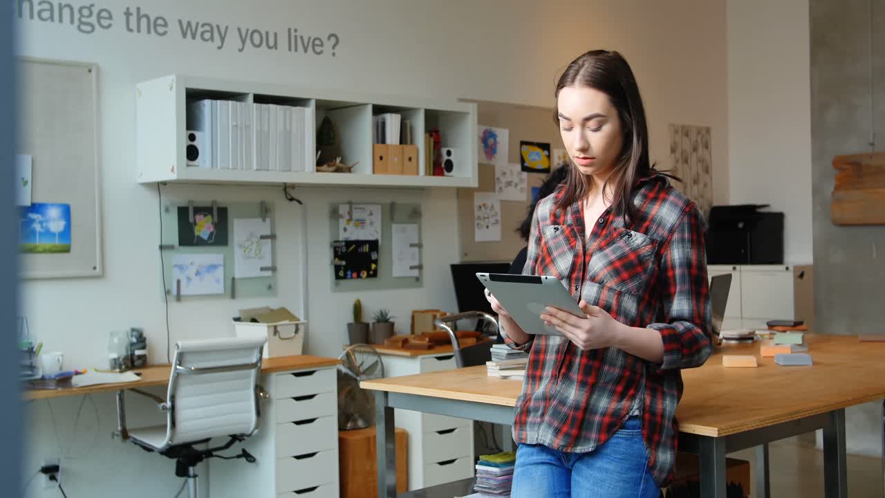 Executive using digital tablet