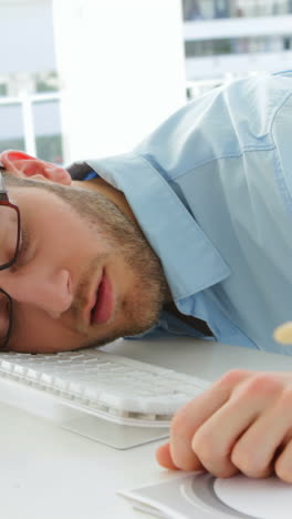 attractive businessman sleeping