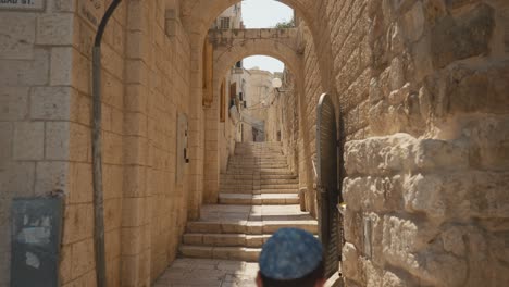 Old-City-of-Jerusalem-Israel-pathway-under-arch-in-holy-place-western-wall