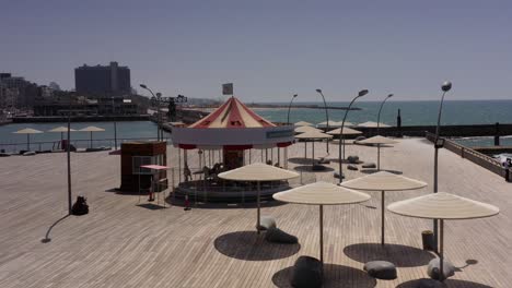 tel aviv pier with carousel and seaside view