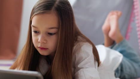 close up view of llittle girl at home