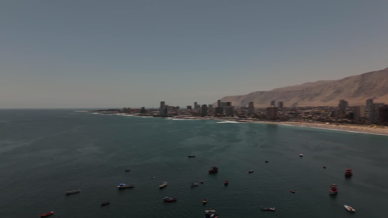 Iquique playa brava chile tarapaca cavancha day beach city fast panoramic view from drone