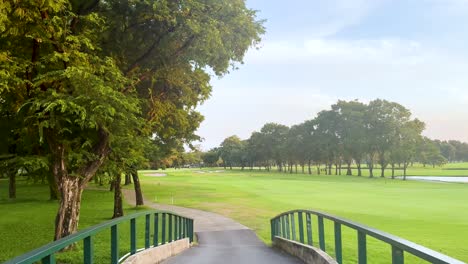 scenic view of bridge and golf course