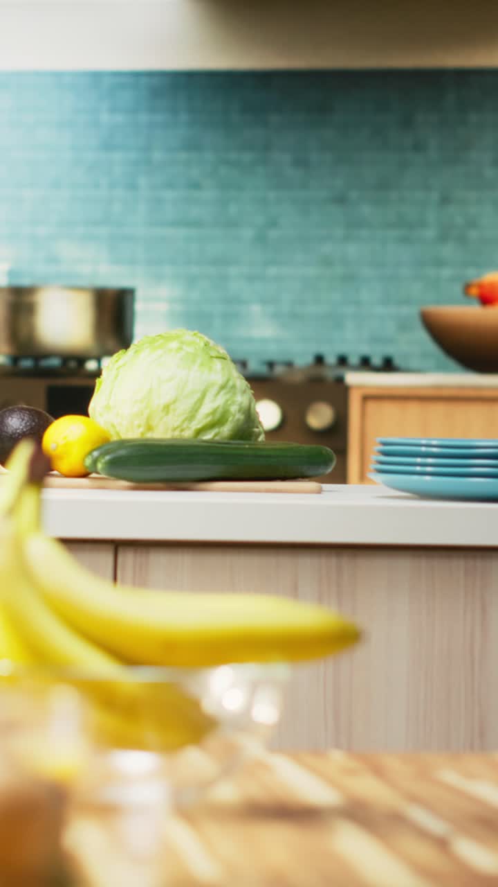 Vertical Video Bright modern kitchen interior with elegant furniture and wooden cupboards