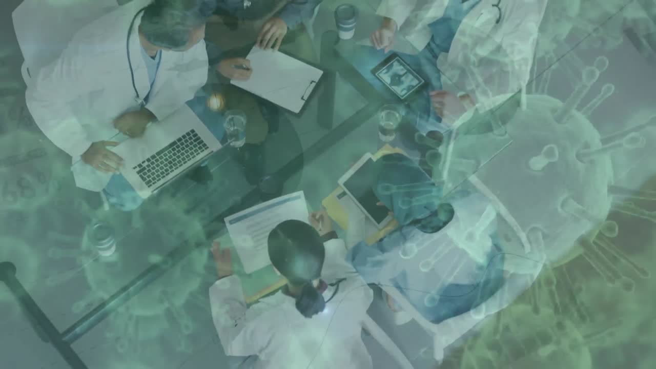 células de covid-19 que se mueven contra el equipo de médicos que trabajan en el hospital