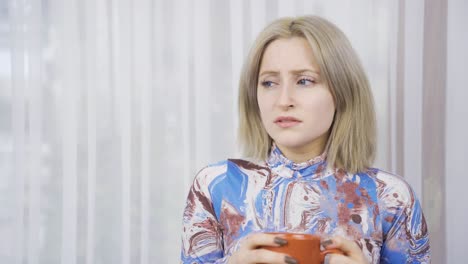 Portrait-of-thoughtful-unhappy-young-woman.