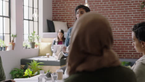 hispanic business woman presenting geodesic dome model in office meeting engineers brainstorming creative design solution discussing ideas in startup workplace presentation