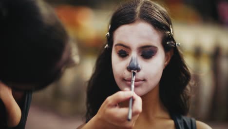 applying sugar skull makeup
