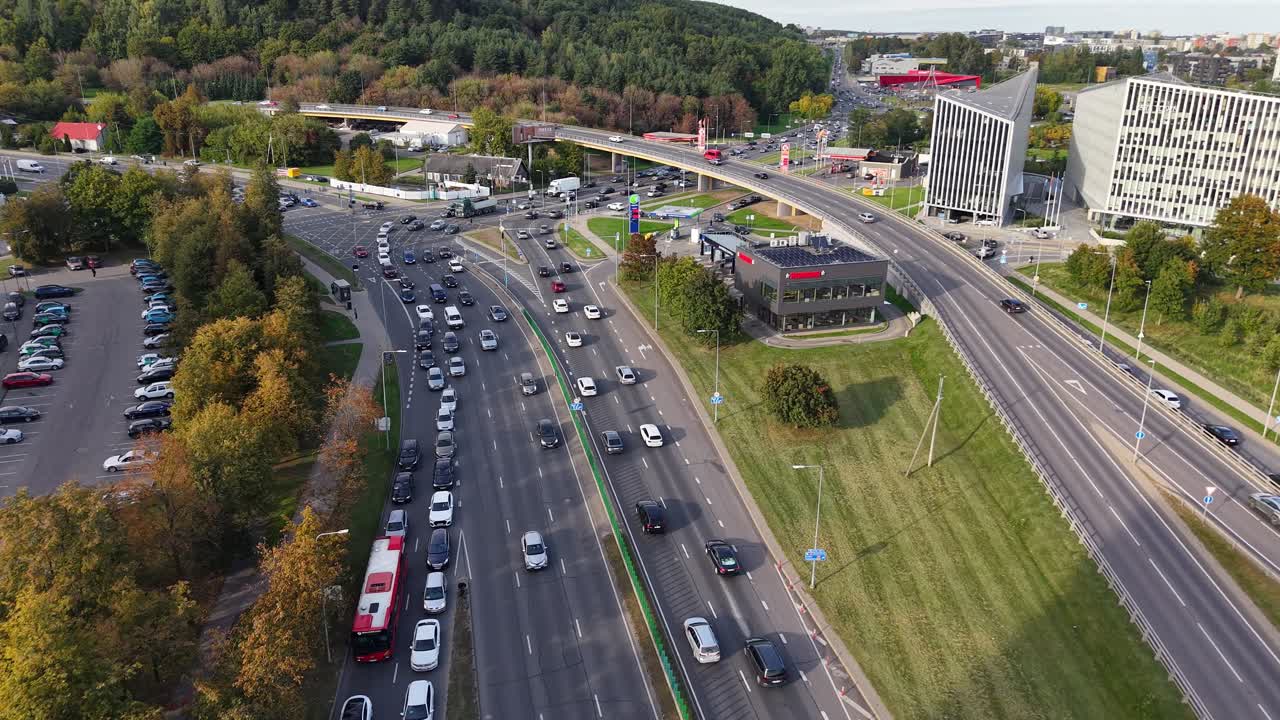 Aerial drone view of heavy traffic congestion on major roads near Vilnius city exit