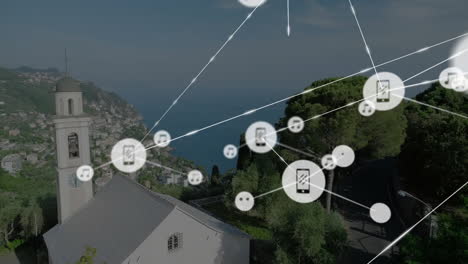 network of connections and data processing animation over coastal town landscape